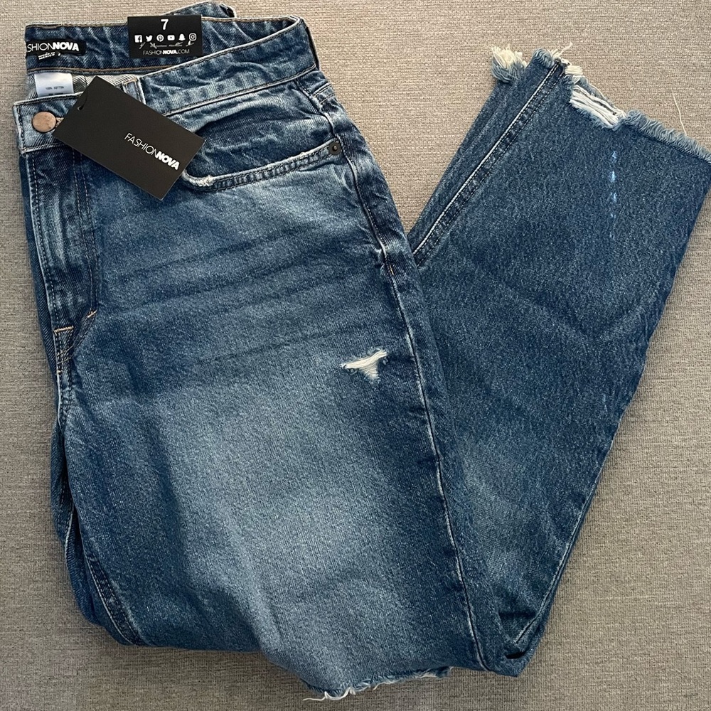 Brand new distressed jeans